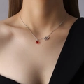 Titanium steel necklace featuring a red agate bead and hollow auspicious cloud pendant - Steel Cloud Style
