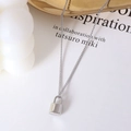 Minimalist silver steel padlock pendant necklace on a decorative jewelry tray - Steel Color Convex Lock (P447) 45+5cm