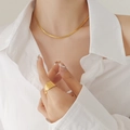 Minimalist 18K gold plated snake chain necklace and striped wide ring set on model - Gold Necklace / Short