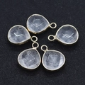 Faceted white crystal teardrop pendant with gold-plated edges and hanging loop - Transparent Crystal
