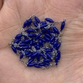 Silver chain featuring deep blue olive-shaped beads for DIY jewelry making - 10m/Roll / Dark Blue (No. 11)