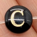 Polished black bead with gold letter C for DIY jewelry making on transparent string - Letter C / 8mm