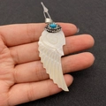 Natural shell wing pendant with rhinestones and turquoise stone detail on hand - Turquoise Decorated Wing Shape / 23x60mm