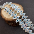 Perles Main de Fatima en nacre avec motif œil bleu pour création de bijoux - Main de Hamsa Horizontale (8x10mm)