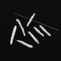 Macro-opname van natuurlijke barokparels met witte glans voor DIY-sieraden maken - Middengat