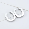 Detailed view of silver U-shaped clip-on earrings with polished geometric metal surface - U-Shape / Black