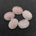Polished oval rose quartz stones for jewelry making, five pieces on black background - Oval Cabochon / Rose Quartz