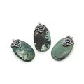 Oval turquoise pendants featuring crystal evil eye detail in teal, black, and blue finishes - Deep Cyan Textured Style (No. 1)