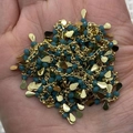 Golden DIY jewelry chain with small blue faceted beads and teardrop pendants in hand - 3x9mm / Malachite green