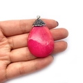 Pink teardrop stone pendant with rhinestone bail shown held in hand for size - Style 2 (Pink)