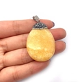 Translucent yellow teardrop stone pendant with black and white rhinestones on silver bail - No.13 (Yellow)