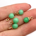 Teardrop light green stone pendants with gold metal base held in hand for DIY jewelry - Light Green Stone Style (5037910906837)