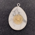 Teardrop white turquoise pendant with golden mandala overlay and silver metal edging - Mandala Flower