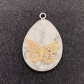 Water drop natural white stone pendant with gold hollow butterfly inlay and silver bail - Butterfly