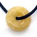 Polished yellow natural stone Ping'an buckle pendant with a black woven cord necklace - Topaz