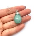 Green aventurine teardrop pendant with silver bail shown held in hand - Light Green (Style 5)