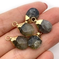 Faceted labradorite teardrop pendant with gold-plated trim shown in palm of hand - 10x19mm 1g/pc / Gray Textured Style (No. 10)