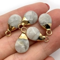 Hand holding five teardrop natural grey marble stone pendants with gold metal plated loops - 10x19mm 1g/pc / Grayish White Textured Style (No. 11)