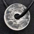Round white crystal donut pendant with black cord necklace and natural textures - White Crystal