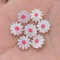 Daisy shaped 10-12mm white sea shell beads with pink core held in hand for jewelry making - 10mm / No. 3 (Pink)