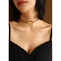 Golden titanium steel thick NK chain choker with belt buckle clasp on female model - Gold