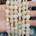Close-up of natural yellow stone flat coin beads showing smooth polished texture - 12x6mm / Citrine (No. 7)