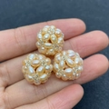 Detailed close-up of 18mm handmade woven natural freshwater pearl beads for jewelry DIY - Pink