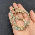 Perle ovali in pietra naturale con trame blu e terrose per la creazione di gioielli - No.11 Trama Paesaggio Misto