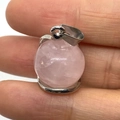 Spherical rose quartz pendant with silver-tone clasp showing natural pink crystal textures - 16x23mm / Rose Quartz
