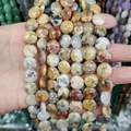 Flat round 12x6mm natural jasper and agate stone beads in earthy reddish-brown tones - 12x6mm / Crazy Agate