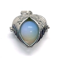 Silver winged heart locket featuring a round white opal stone gemstone pendant - Opal