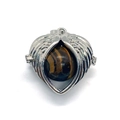 Silver angel wings locket pendant featuring a natural tiger eye stone sphere - Tiger's Eye