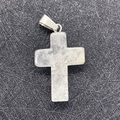 Cross pendant crafted from clear natural crystal stone with silver metal bail on black background - White Crystal