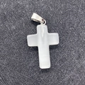 Polished white selenite stone cross pendant with silver bail on a textured background - White Cat's Eye (No.33)