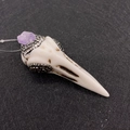 Detailed close-up of bird skull pendant with purple gemstone and inlaid rhinestones - Bird Skull Style (26x69mm)