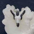 White acrylic bull head pendant with black rhinestones on a white mineral stone background - Style 1 (26x30mm)
