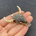 Ethnic bull head pendant in white and brown acrylic with metallic bead details - No.1 (Off-white/Vintage Texture)