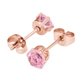 Close-up of pink round-cut cubic zirconia stud earrings in rose gold claw settings - 3mm Zirconia / Rose Gold + Pink