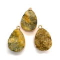 Detailed close-up of three teardrop natural stone pendants with rose gold metallic edging - Light Yellow Style (11)