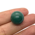 Polished round natural green aventurine loose bead held between fingers for DIY jewelry - Green Aventurine