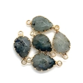 Macro detail of faceted teardrop labradorite stone connectors with gold plated edges - Flash Stone (Labradorite)
