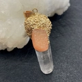 Macro detail of natural druzy stone pendant with raw quartz and gold electroplated edge - 20x30-30x70mm / No. 5 (Orange Pink Druzy Clear Crystal)