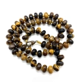 Polished brown tiger eye stone beaded necklace with a silver lobster clasp closure - Tiger's Eye