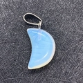 Crescent moon-shaped opalite stone pendant with silver clasp on a black textured surface - 12x18mm / Opal