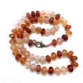 Handmade necklace with 5x9mm ruby zoisite and agate beads featuring a silver lobster clasp - Red Agate