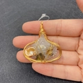 Detail of handcrafted wire-wrapped pendant with baroque pearls and natural crystals - Style 6 (Colored Pearl Cluster)