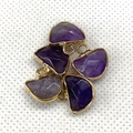 Macro detail of five faceted purple amethyst pendants with elegant gold plated metal borders - 13x14mm / Purple Crystal