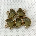 Macro detail of semi-circular faceted stone charms with gold-plated edges for DIY jewelry - 13x14mm
