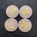 Set of four rose quartz round flat stones with gold etched mystical symbols on black - Rose Quartz