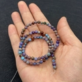 Blue and purple imperial stone beads for DIY jewelry making in a hand-held view - 4mm / No.3 (Blue-Purple Texture)